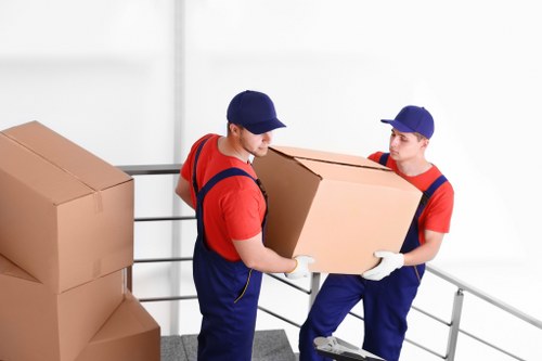 Team member loading items safely into a van