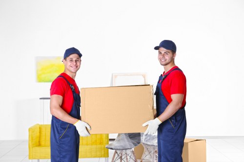 Packed boxes and furniture ready for collection in Southgate