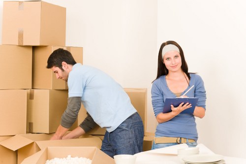 Packed boxes and furniture ready for a house move in Southgate