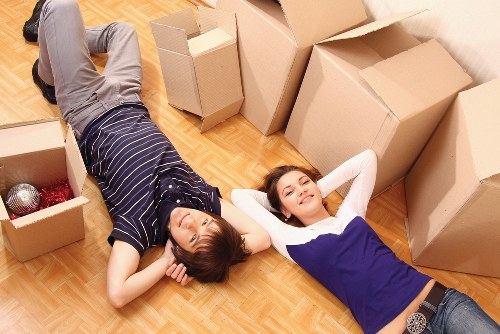 Local moving truck handling furniture and boxes in Southgate